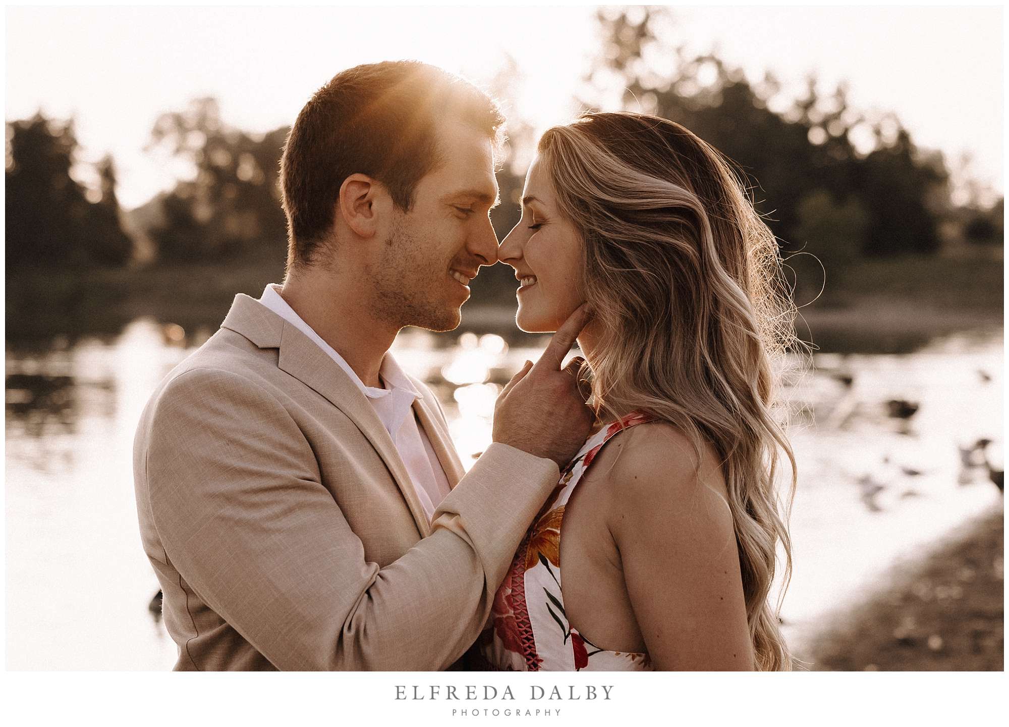 Gorgeous engaged couple during sunset